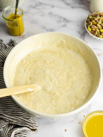 pistachio cake batter with whipped aquafaba folded through.