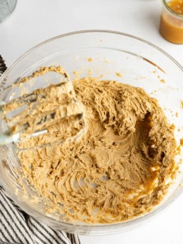 vegan butter and brown sugar creamed in a large clear bowl.