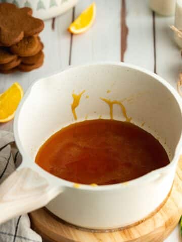 sugar melted into caramel in a saucepan.
