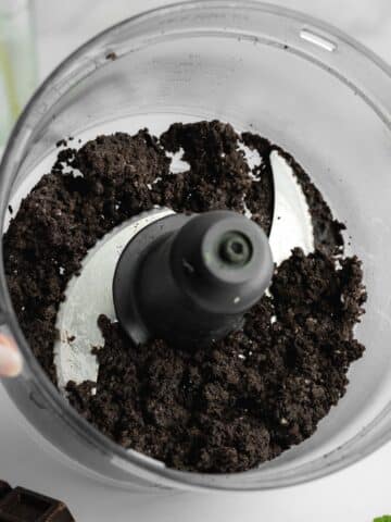 oreo cookie crust in a food processor jug.