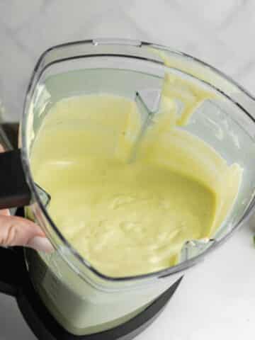 mint cheesecake filling in a blender jug.