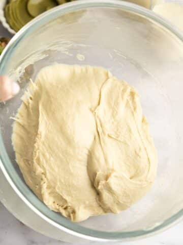 cinnamon roll dough after kneading in a stand mixer.
