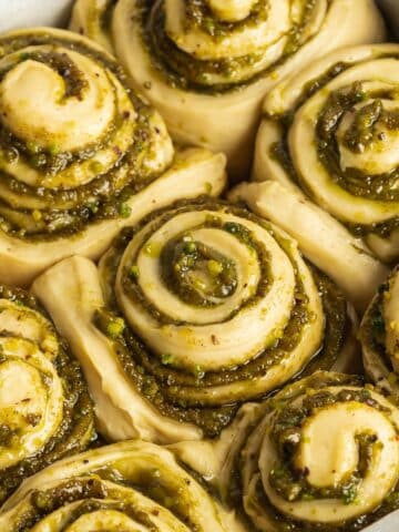 puffed up pistachio rolls after second proof.