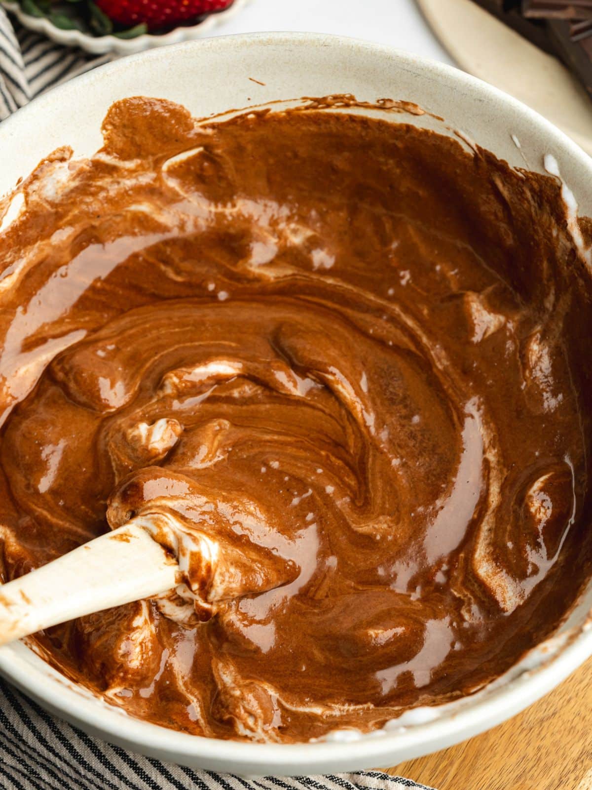 melted chocolate ganache partially combined with whipped aquafaba.