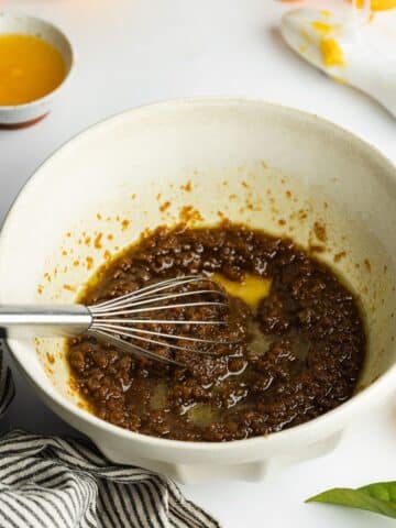 brown sugar, fresh orange zest, and olive oil whisked in a bowl, it appears a little separated which is normal.