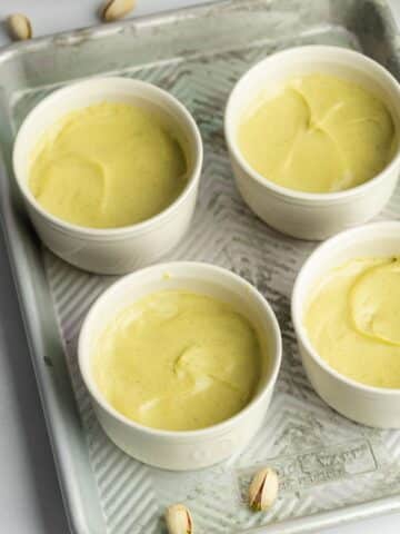 pistachio creme brulee custard divided between 4 ramekins.