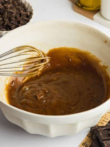 wet ingredients for olive oil cookies whisked until smooth in a large bowl.