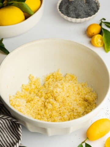 sugar with fresh lemon zest rubbed into it, in a large bowl.
