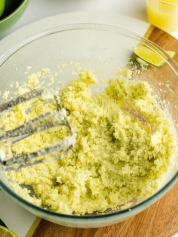vegan butter and lime sugar creamed until light and airy in a mixing bowl.