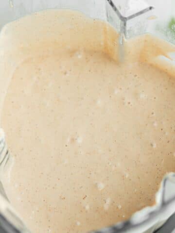 smooth cheesecake batter in a blender jug.