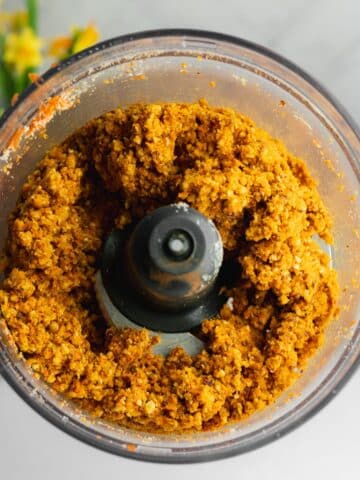 carrot cake base in a food processor jug.