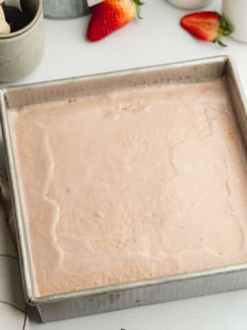 tres leches soaked in strawberry milk mixture.