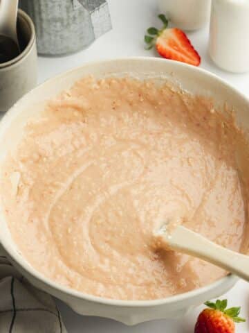 strawberry cake batter in a ceramic bowl.
