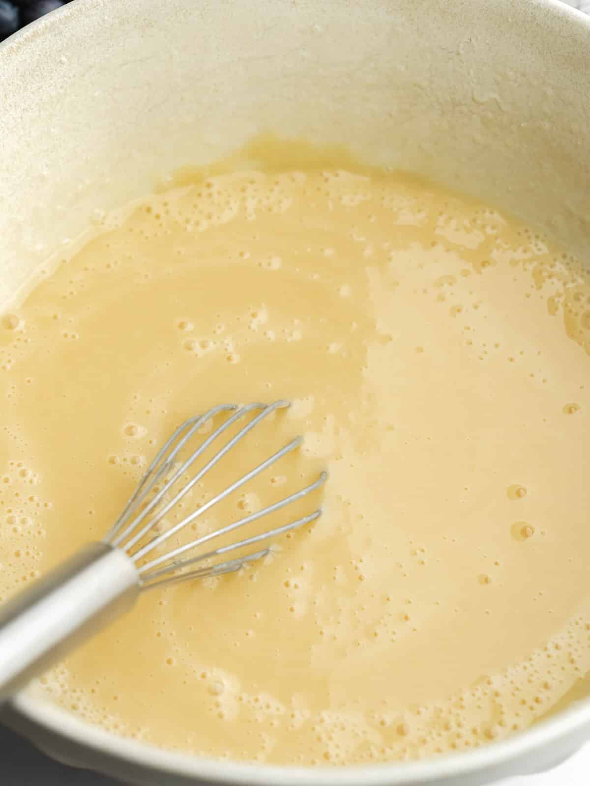 vegan buttermilk whisked into the sugar mixture until combined.