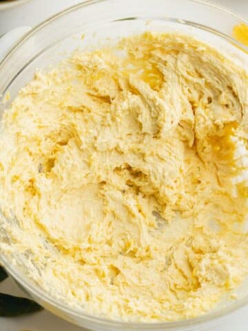 vegan butter, lemon zest, sugar, yogurt, and vanilla creamed in a bowl.