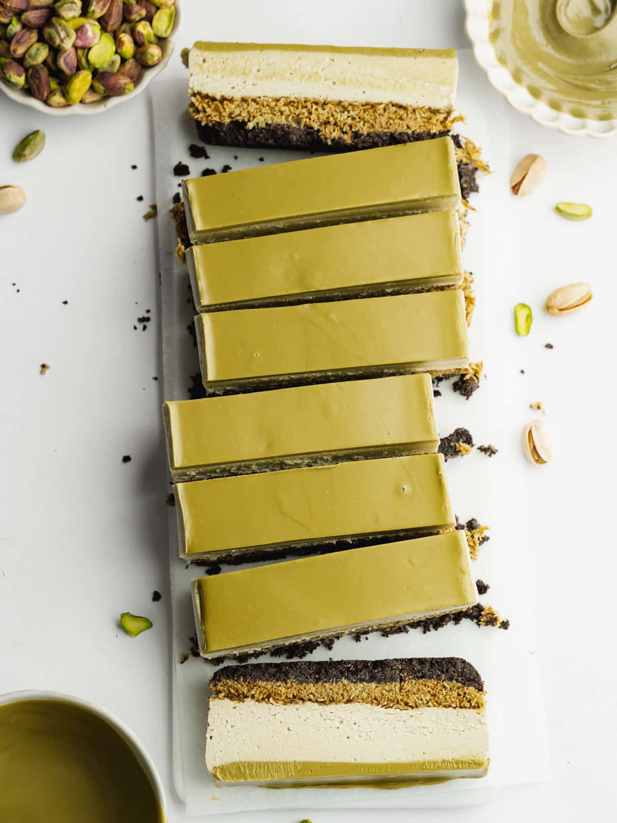 pistachio cheesecake made in a loaf pan and cut into bars.
