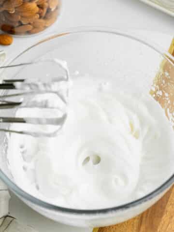 aquafaba whisked in a bowl until fluffy.