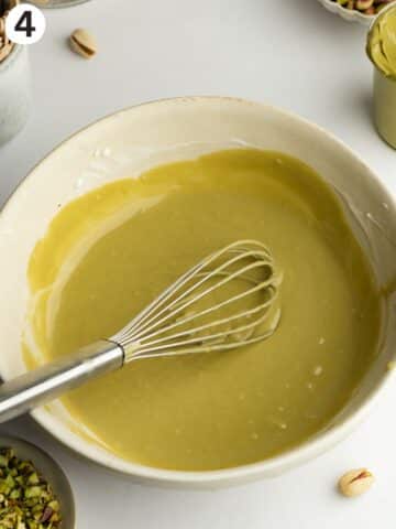 pistachio ice cream in a bowl before dividing into molds.