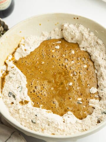 dry ingredients in a large bowl with a well in the center filled with the wet ingredients.
