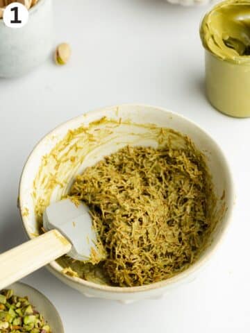 crunchy kataifi pastry mixed with pistachio cream in a small bowl.
