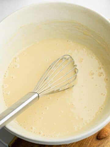 wet ingredients whisked until smooth in a ceramic bowl.