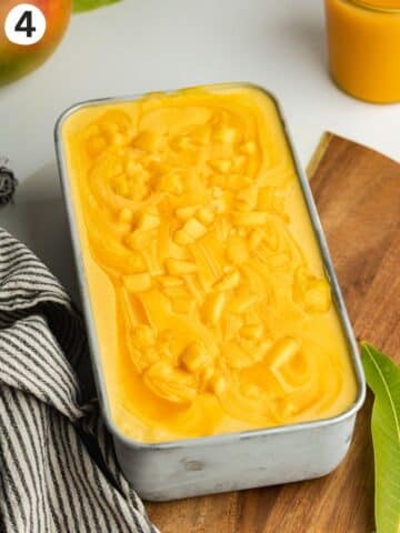 mango ice cream in a loaf pan before going into the freezer to set.