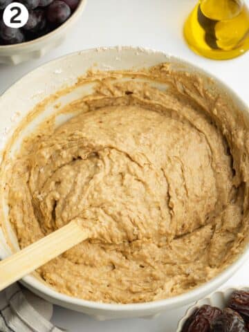 thick cake batter in a ceramic mixing bowl.