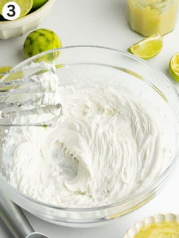 coconut whipping cream whipped in a bowl until fluffy.