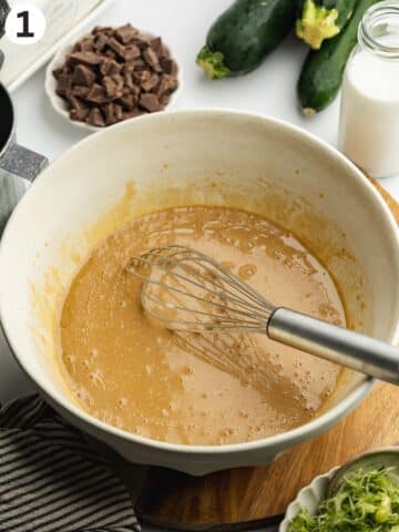 coconut sugar, milk, vinegar, yogurt, and vanilla whisked in a ceramic bowl until smooth.
