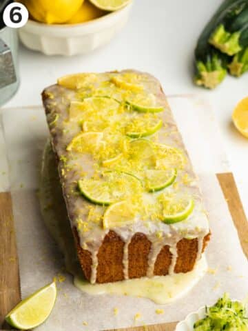 courgette loaf cake topped with lemon glaze, fresh lime and lemon zest.