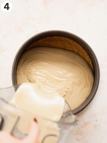 pouring banana cheesecake filling into a cake pan.