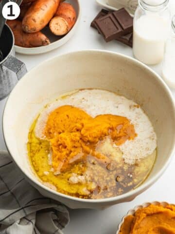 sweet potato puree, vegan buttermilk, olive oil, espresso, vanilla, and coconut sugar in a large ceramic bowl before whisking.