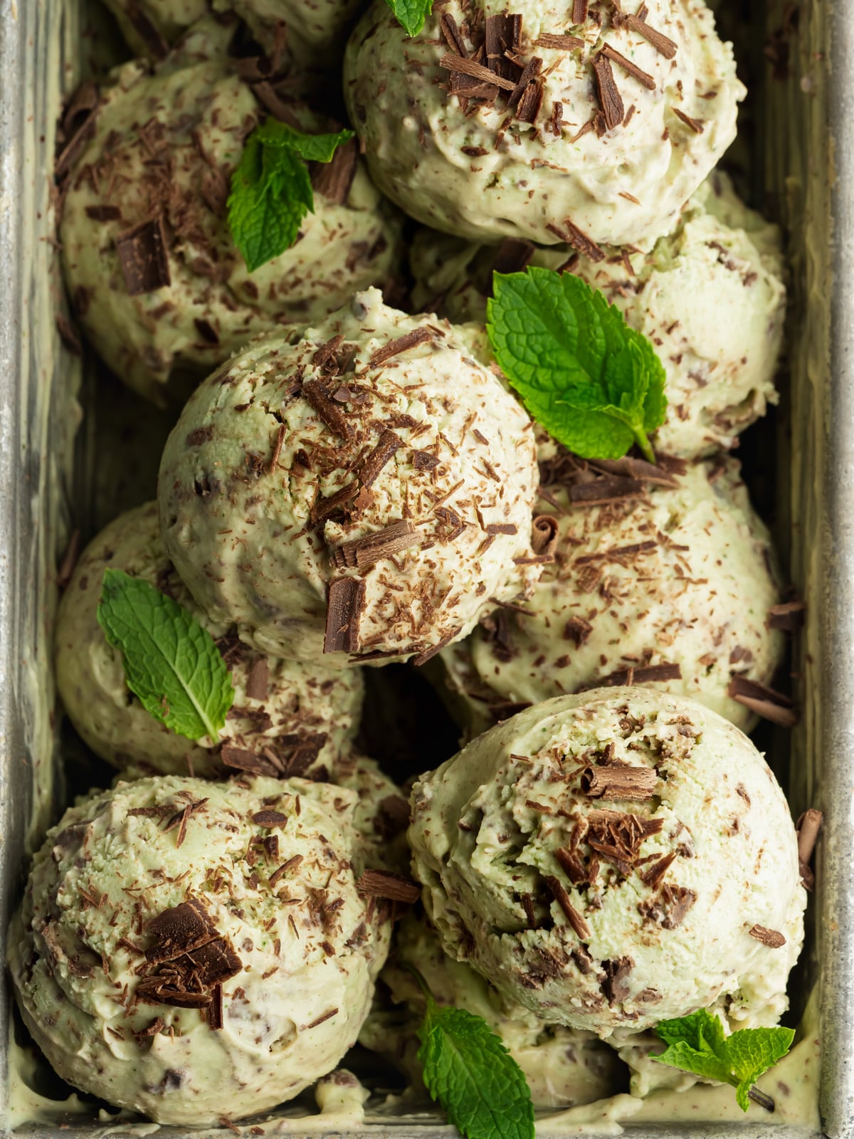 mint chocolate chip ice cream balls in a loaf pan.
