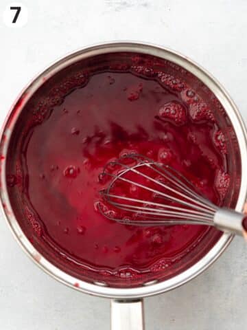 whisking cherry sauce with cornstarch slurry until thickened.