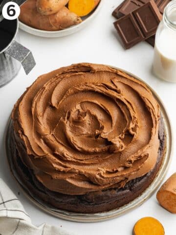 sweet potato chocolate cake topped with swirls of thick sweet potato chocolate frosting.