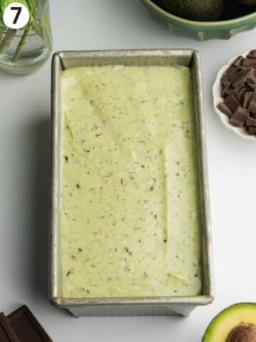 mint choc chip ice cream in a loaf pan before freezing.