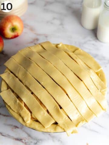 apple pie with a layer of crust strips on top.