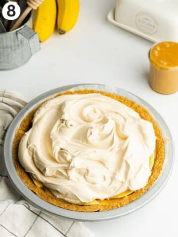 banoffee pie topped with espresso whipped cream.