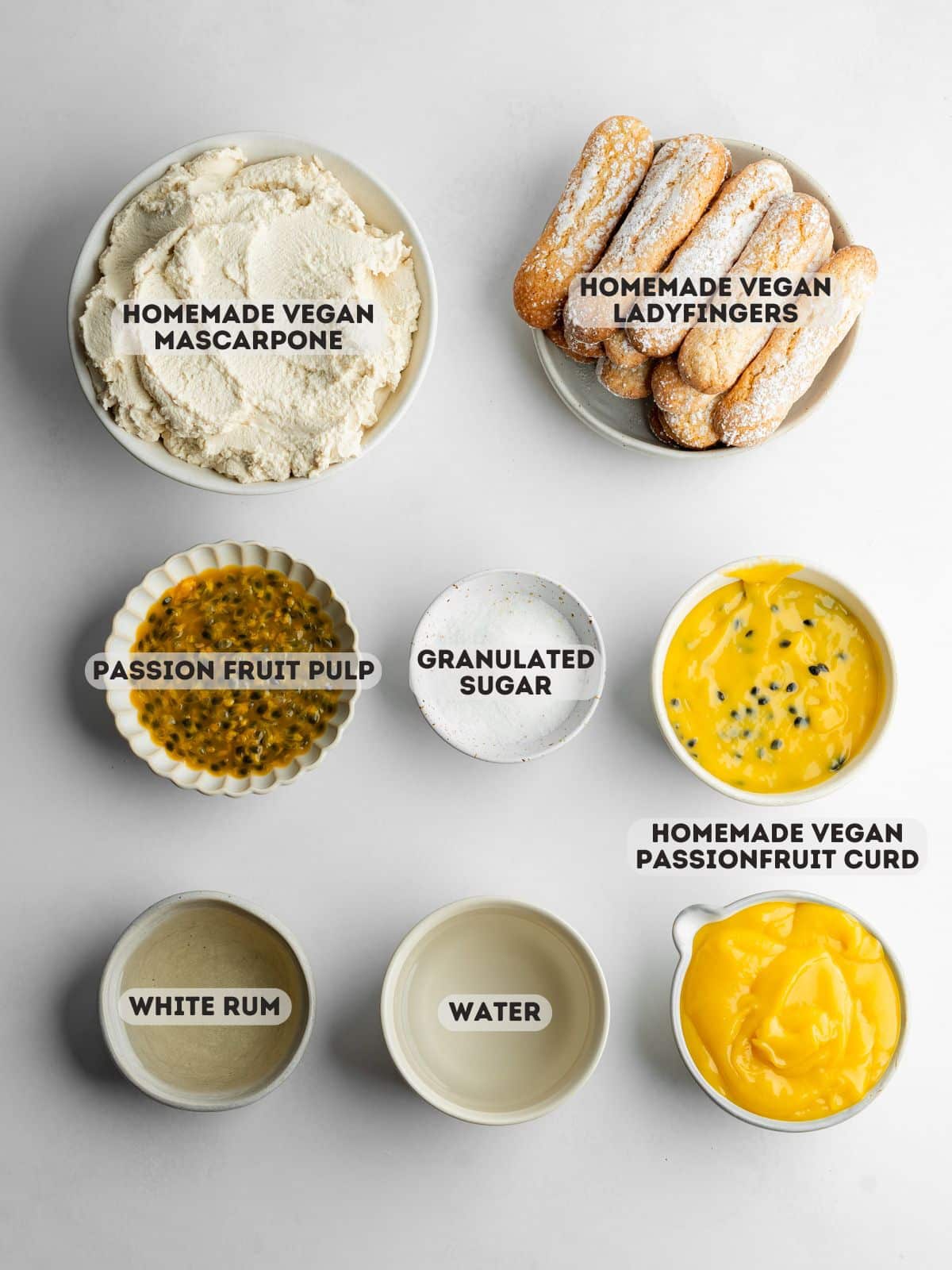 ingredients for passion fruit tiramisu measured out in bowls.