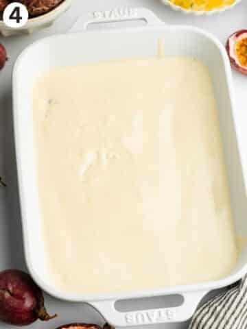 passion fruit mascarpone layered with ladyfingers in a staub dish.