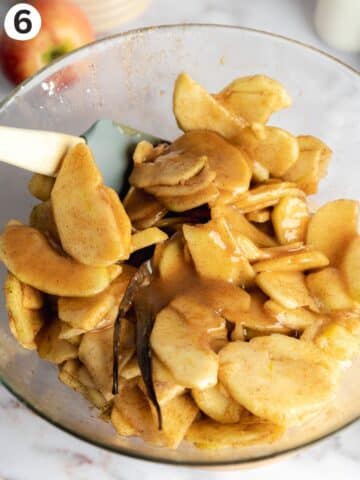 apple pie filling in a large mixing bowl.