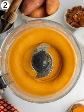 sweet potato puree with vanilla and yogurt blended smooth in a food processor jug.