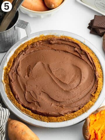 smooth chocolate pie filling in a pie crust before going into the fridge to set.