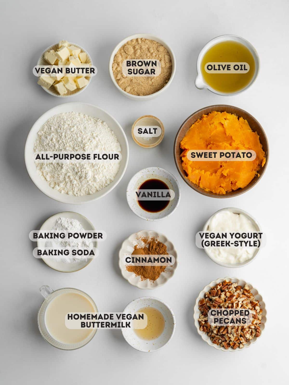 ingredients for sweet potato coffee cake measured out in bowls.