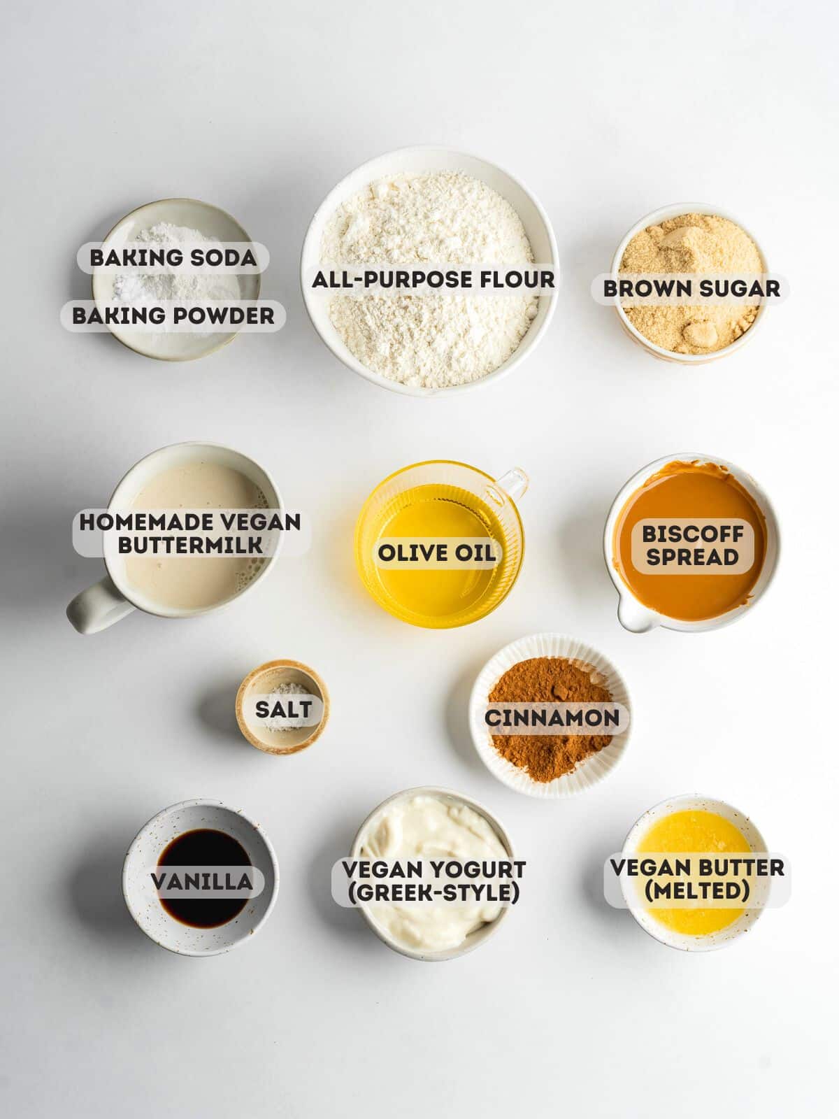 ingredients for biscoff crumb cake measured out in bowls.