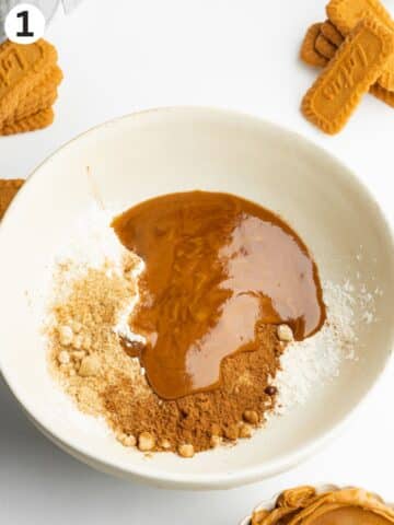 ingredients for biscoff crumble topping in a bowl before mixing.