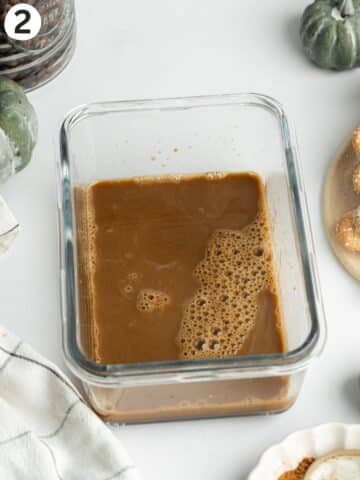 milky coffee soak in a shallow glass tub.