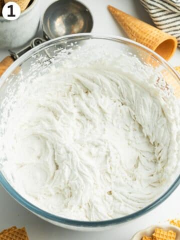 coconut whipping cream whipped until fluffy with vanilla in a mixing bowl.