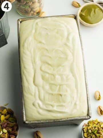 pistachio ice cream in a loaf pan before freezing.