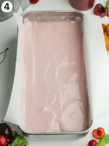 cherry cheesecake in a loaf pan before chilling.
